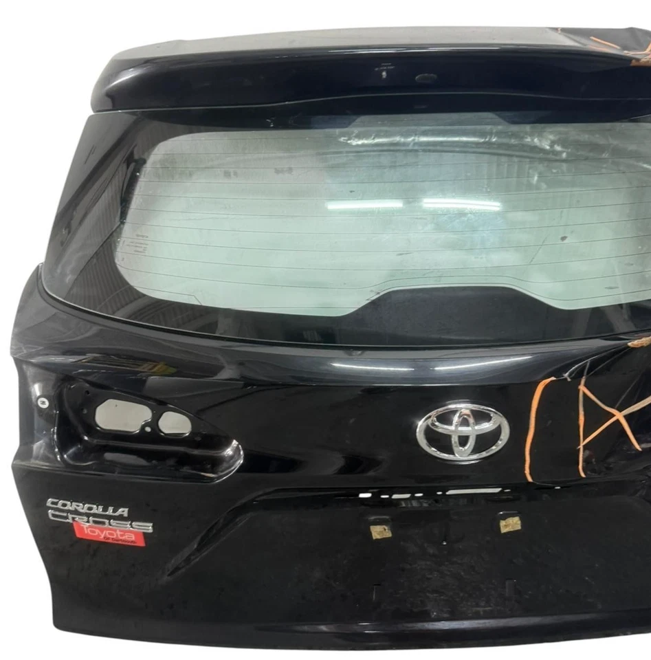 Toyota Corolla 2022-2024 tapa maletero cruzado puerta trasera negro OEM Foto 3 de 4