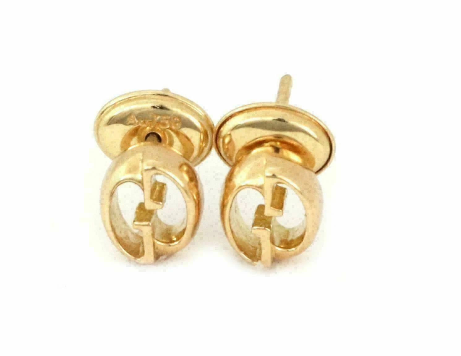 Boucles d'oreilles clous forme ovale logo Gucci G or jaune 18 carats