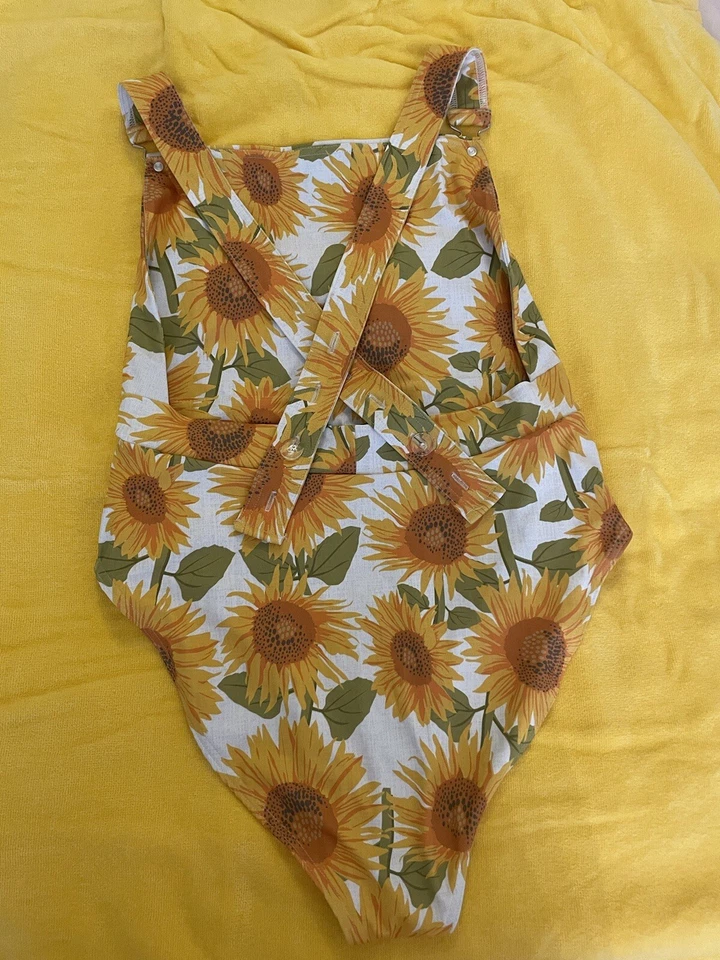 Mono de natación de girasol con leche negra de una pieza Foto 2 de 4