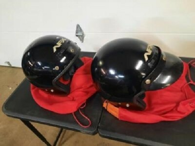 pair of open face helmets both med.