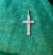 Vintage 14K white gold cross pendant with diamond accents