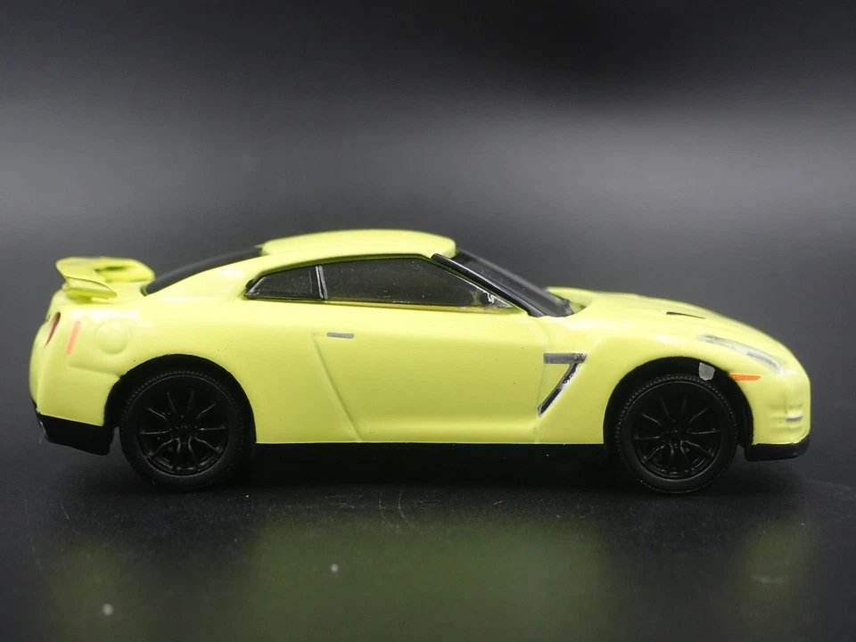 Modello Auto Diecast Diorama In Scala 1:64 NISSAN SKYLINE GTR R35 NEON 2007-2025 - Immagine 3 di 4