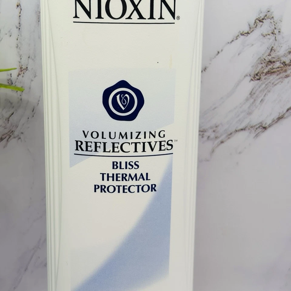 PROTECTOR TÉRMICO BLISS REFLECTANTES VOLUMINIZADORES NIOXIN 16,9 OZ 90% Completo Foto 4 de 4