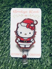 Christmas - Hello Kitty Santa badge reel