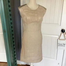 Bebe Elegant Beige Sleeveless Dress with Sheer Accents