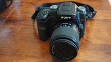 Sony Alpha 100 DSLR Sony 18 70mm Lens Clean NP FM50 Battery Charger CF