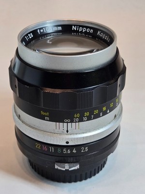 Nikkor - P Auto 105mm f2.5 Ai lens. Exc. With caps and hood