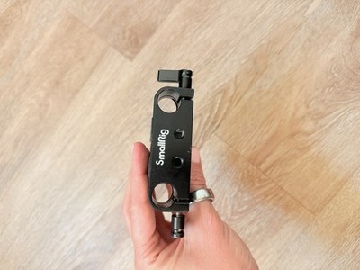 SmallRig baseplate with dual 15mm rod clamps, used for camera mounting
