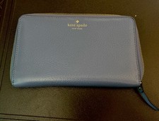 Kate Spade bluish purple pebbled leather zip bifold wallet exterior pocket