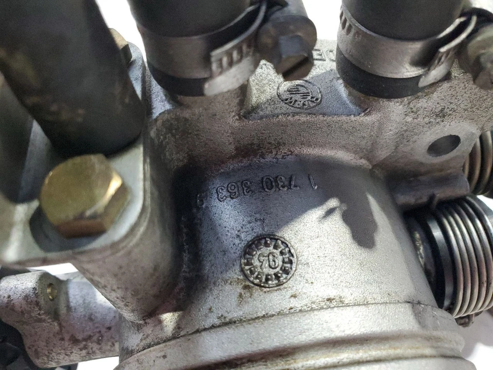 Cuerpo del acelerador de inyección de combustible usado se adapta a: 1995 BMW 325i Cpe MT grado A Foto 2 de 4