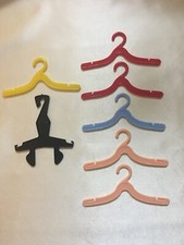 Vintage Barbie and Ken clothes hangers