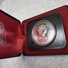 1975 Calgary 100th Anniversary Silver Canadian Dollar W/Box.