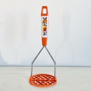 VTG 1950s 1960s Retro Skyline potato masher Orange With Flowers Design Rare