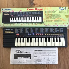 Casio SA-1 Tone Bank 32-Key Electronic Keyboard, Speaker, Box & Manual