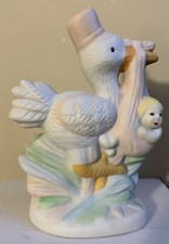Vintage Porcelain Stork Carrying Baby Girl