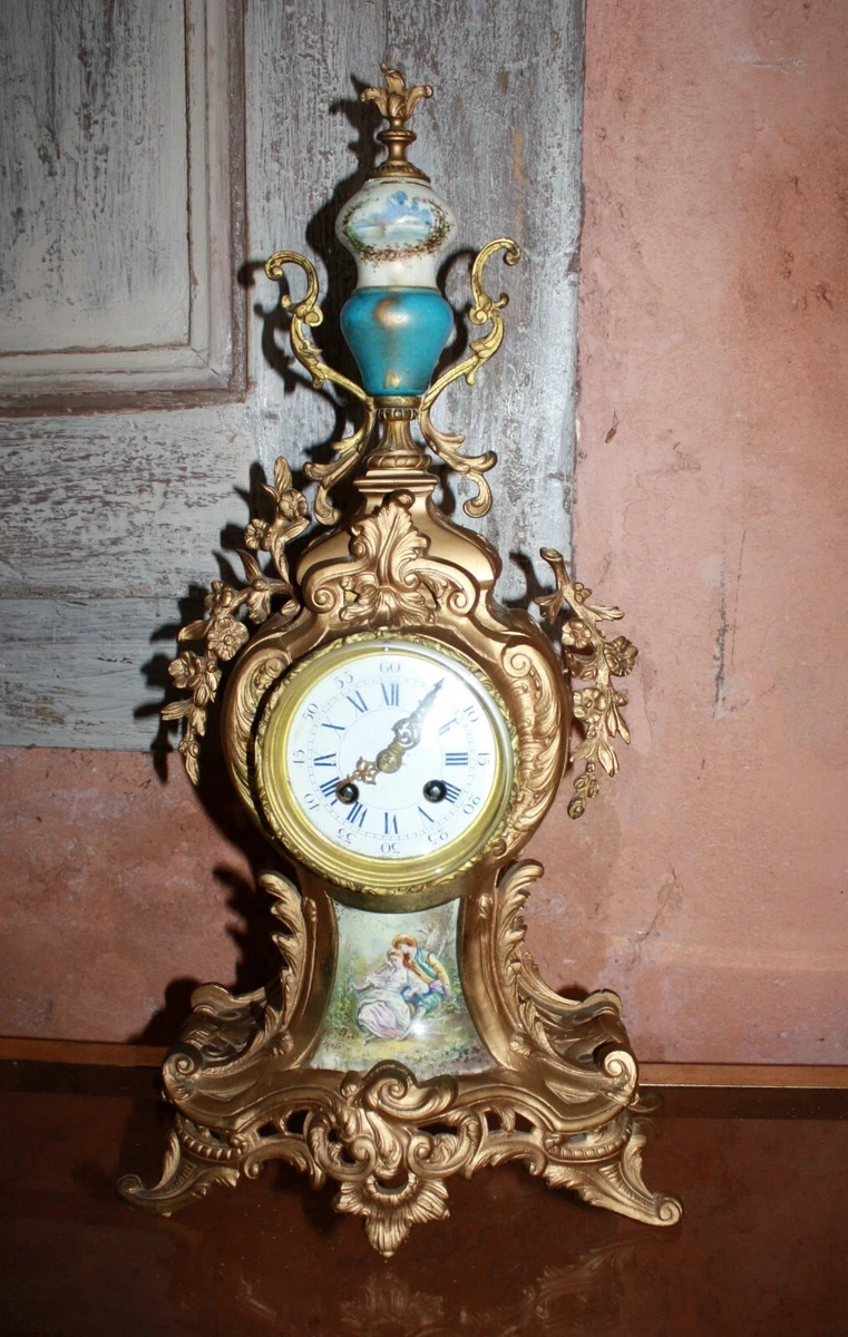 Horloge en bronze doré et porcelaine du 19e siècle par Miroy