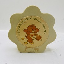 Banco de monedas de cerámica Care Bears Friend Bear amarillo en forma de flor