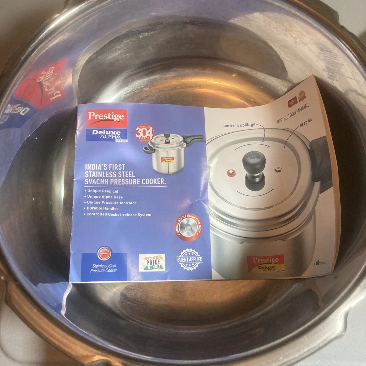 Prestige deluxe alpha online pressure cooker manual