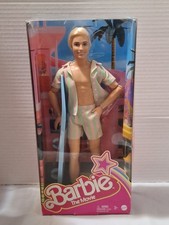Barbie The Movie Ken Doll Wearing Pastel Striped Beach Matching Set (HPJ97)