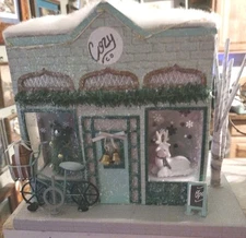 Putz Shop In Mint Green With Window Display Lighted 7" Tall. Cozy Co.