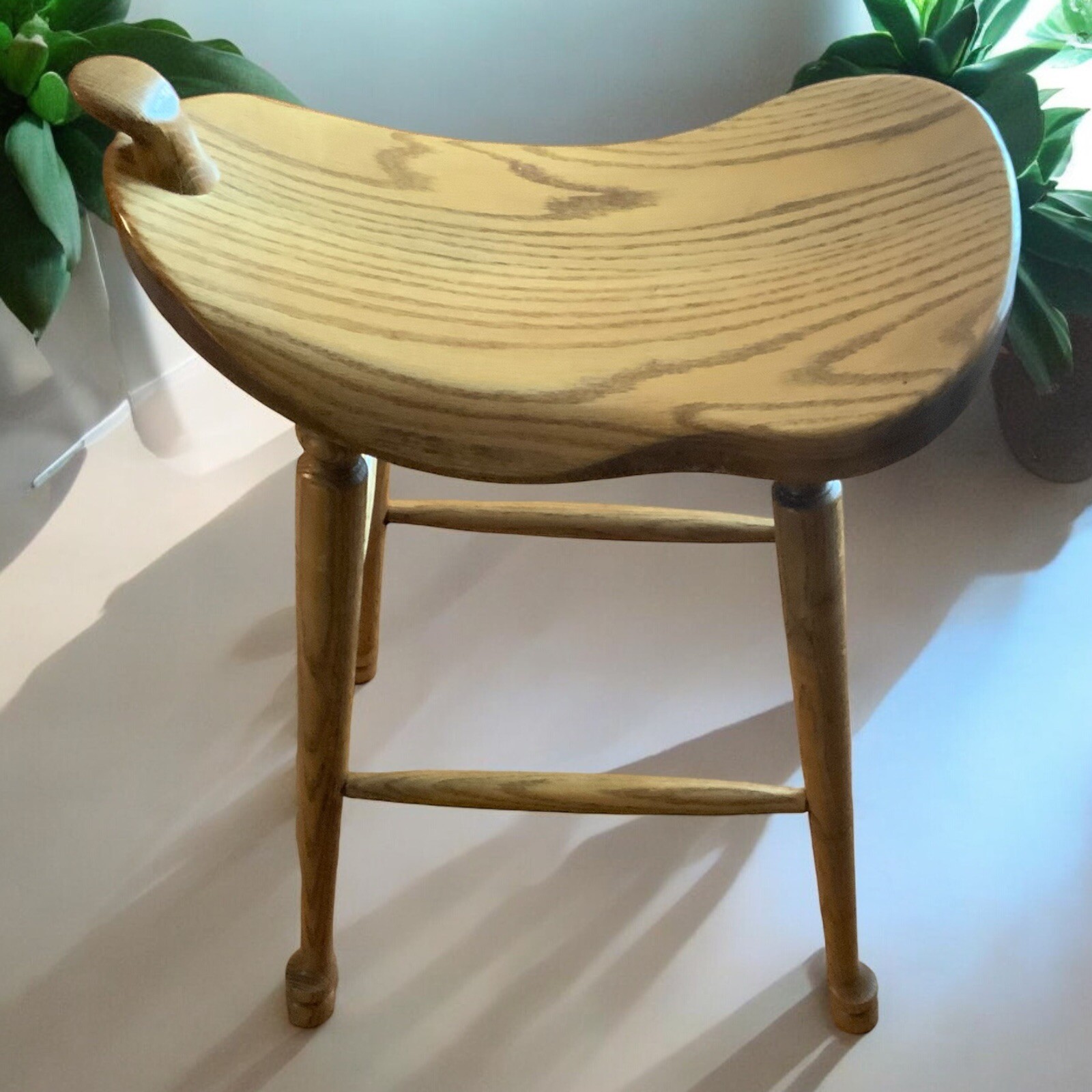 Antique Oak Saddle Stool: Timeless Elegance for Classic Interiors