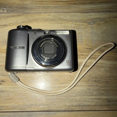Canon PowerShot A1100 IS 12.1MP Digital Camera 4x Zoom Silver Tested Works