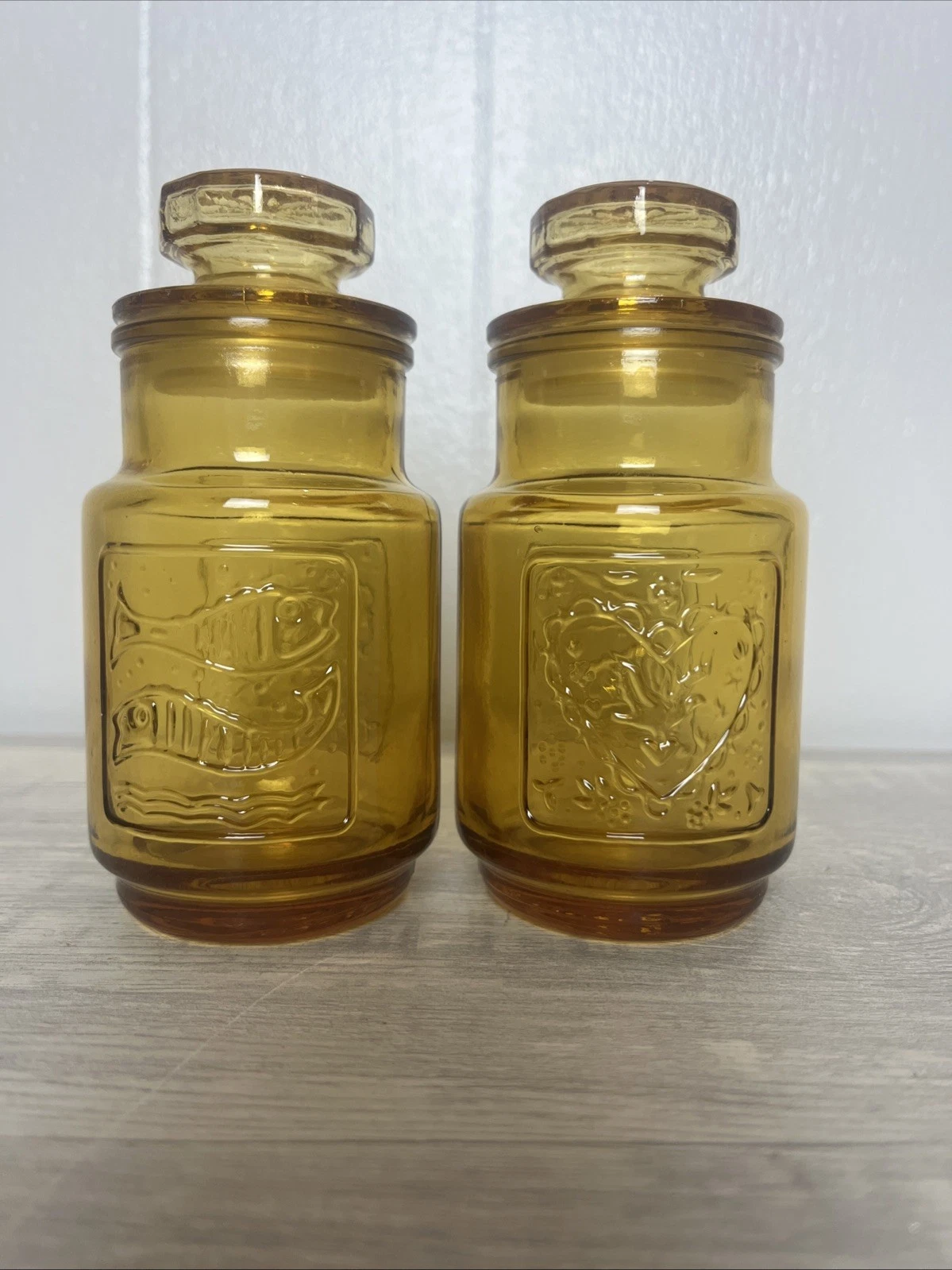 Lot of 2 Vintage Amber Wheaton 4.75" Glass Jars with Lids Hearts & Fish