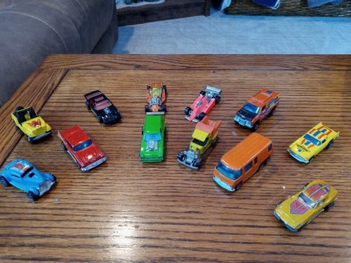 VINTAGE HOT WHEELS-  base dated 1970's - 1980's lot of 12-- ( #1  LOT )