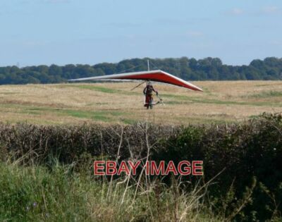 PHOTO  HANG GLIDER HE HAS JUST LANDED IN A FIELD ALONGSIDE DRAYTON ROAD NEAR TO