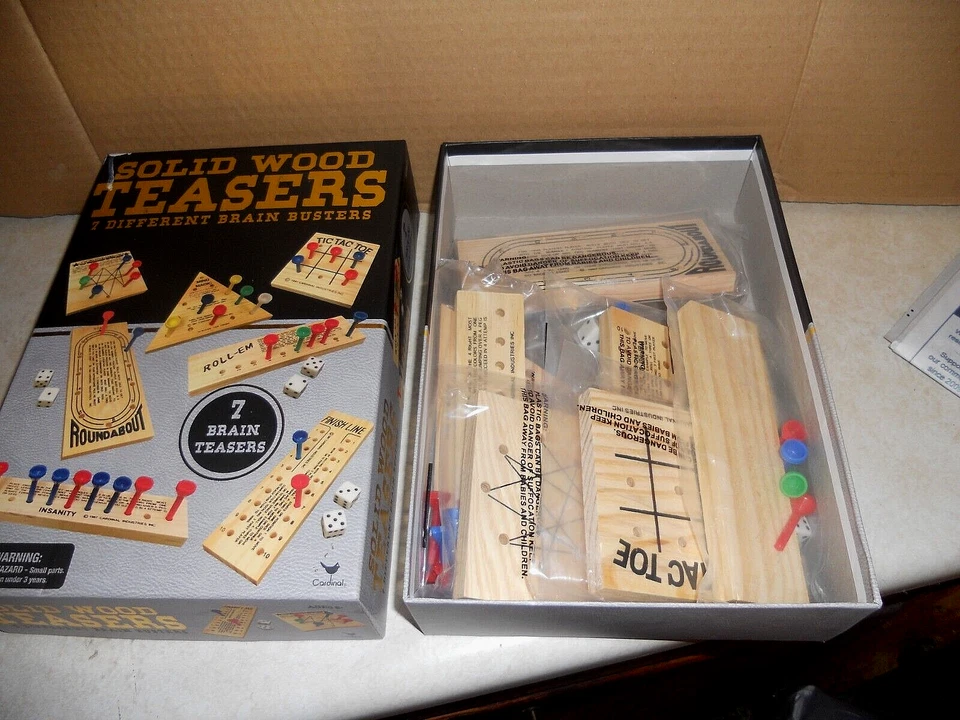NIB CARDINAL SOLID WOOD 7 BRAIN TEASERS/54 GAME PEGS/6 DICE & INSTR* FREE SHIP - Image 3 of 4