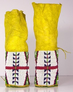 PAIR OF 1890s NATIVE AMERICAN SIOUX INDIAN BEAD & PAINT DECORATED HIDE LEGGINGS