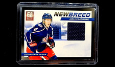 2011 2011-12 Panini Elite New Breed Materials #24 John Moore Rookie RC Card. rookie card picture