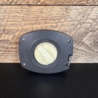 Black textured Stanley 50 foot hand crank with white circular blade and brass screw holes, made in USA.