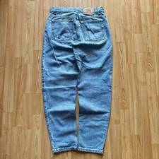 Vintage 90  s Lightwash Woman  s Tapered Levi  s 550 Jeans Size 30X30 