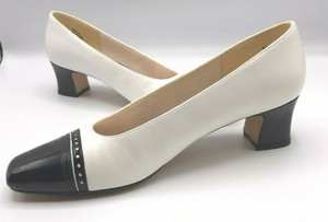spectator pumps black white
