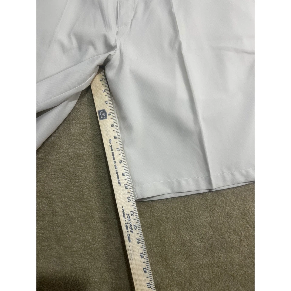 Pantalones Cortos de Golf Adidas Para Hombre 40 Beige Frente Plano Rendimiento Elástico Chino Foto 2 de 4