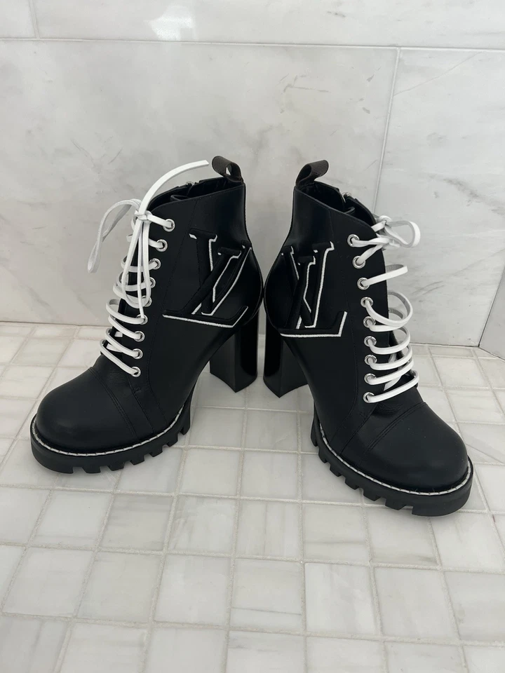 Botines Louis Vuitton Star Trail bicolor con logotipo en cuero negro Foto 3 de 4