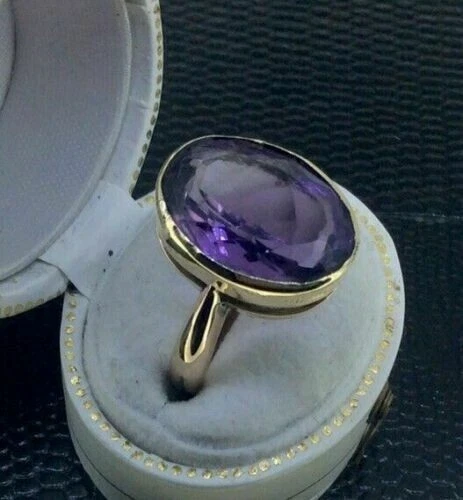 Anillo de compromiso de boda solitario de amatista de corte ovalado de 5 quilates acabado en oro amarillo de 14 quilates Foto 2 de 4