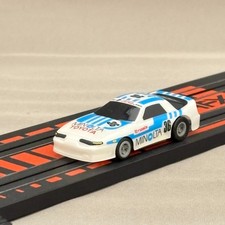 AFX Minolta Toyota Supra Turbo HO Slot Car Feather Magna Car Tomy In Stock