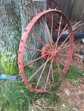 2 cast iron farm wagon wheels