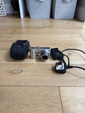 Panasonic Lumix DMC-TZ10 10.1MP Compact Digital Camera Silver And Case + Charger