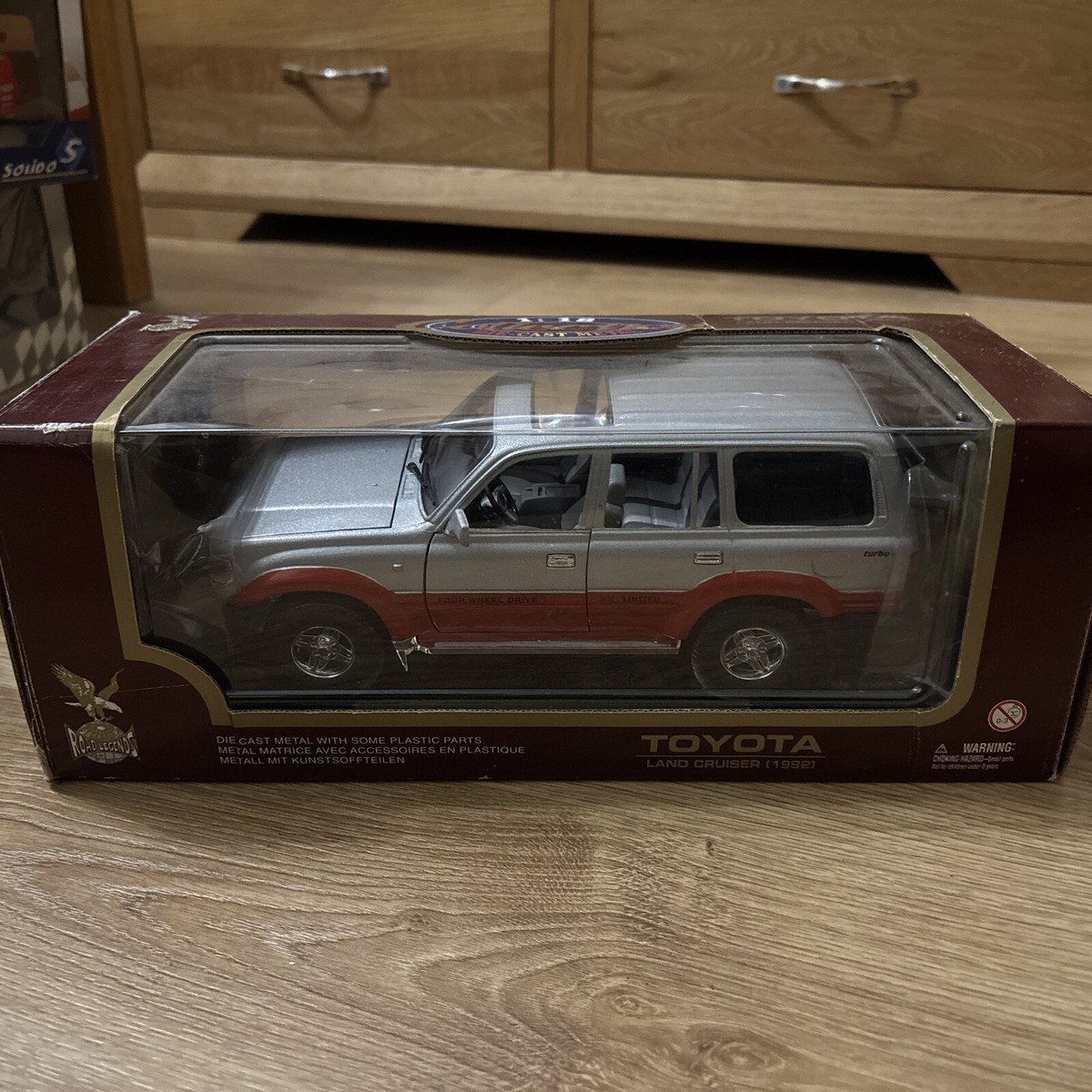 1:18 Road Legends Toyota Land Cruiser, 1992, Red & Silver, Boxed