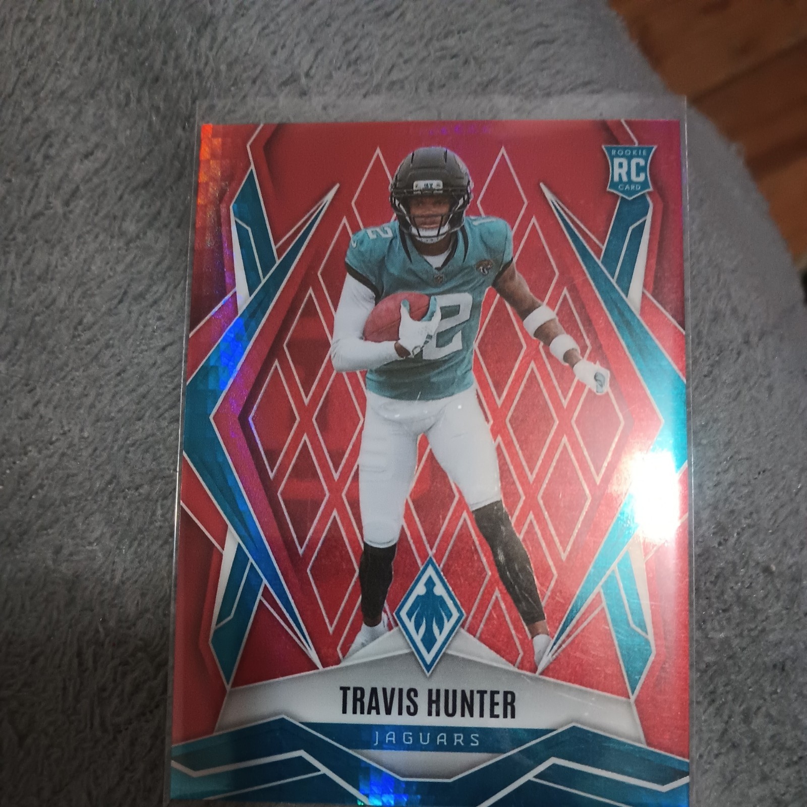2025 Panini Phoenix - Rookies Travis Hunter #157 Red Hyper /399 (RC) JAGUARS