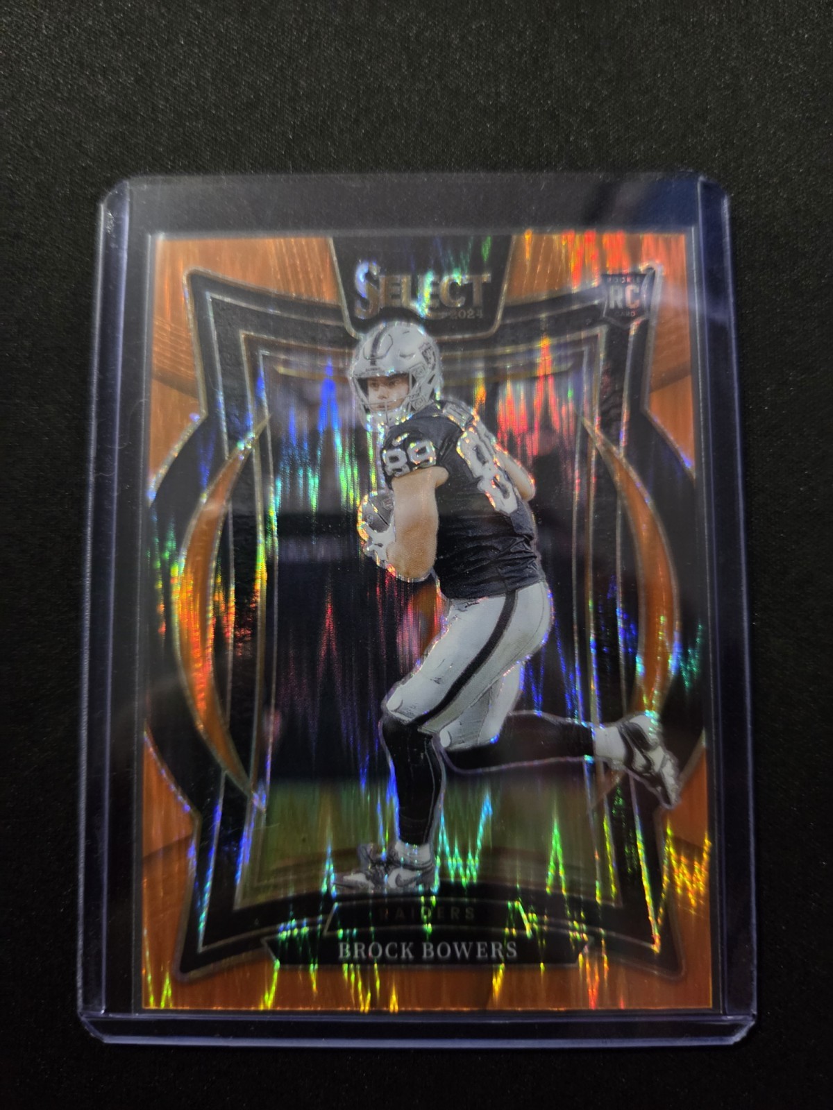 2024 Panini Select - Concourse Brock Bowers #31 Orange Prizm Shock 55/499