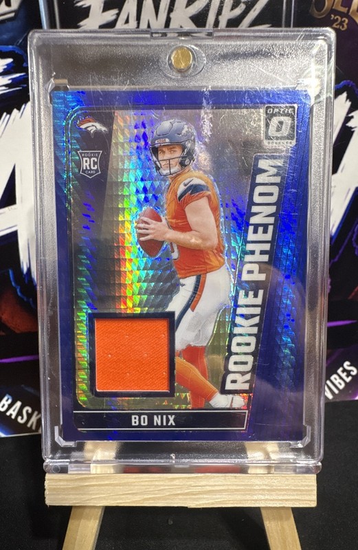 2024 Panini Donruss Optic - Rookie Phenom Bo Nix Blue Hyper Prizm (MEM, RC)