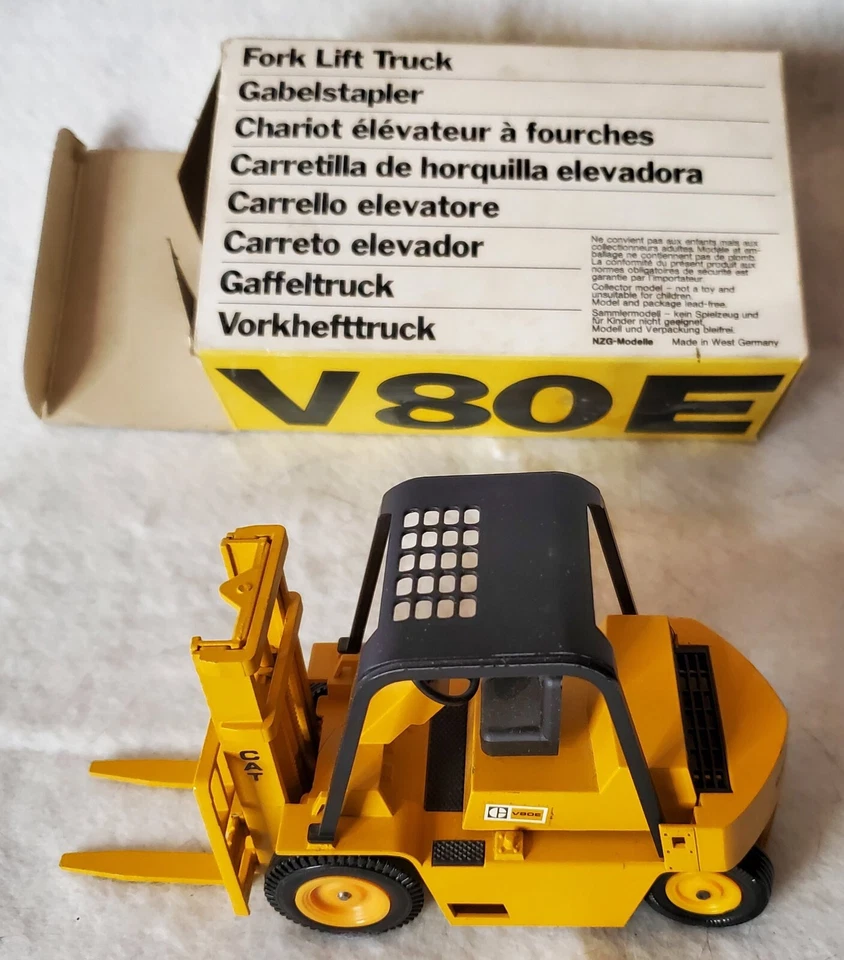 Carretilla elevadora de horquilla vintage CATERPILLAR V 80 D 1:25 NZG 182 Alemania Occidental con caja Foto 4 de 4
