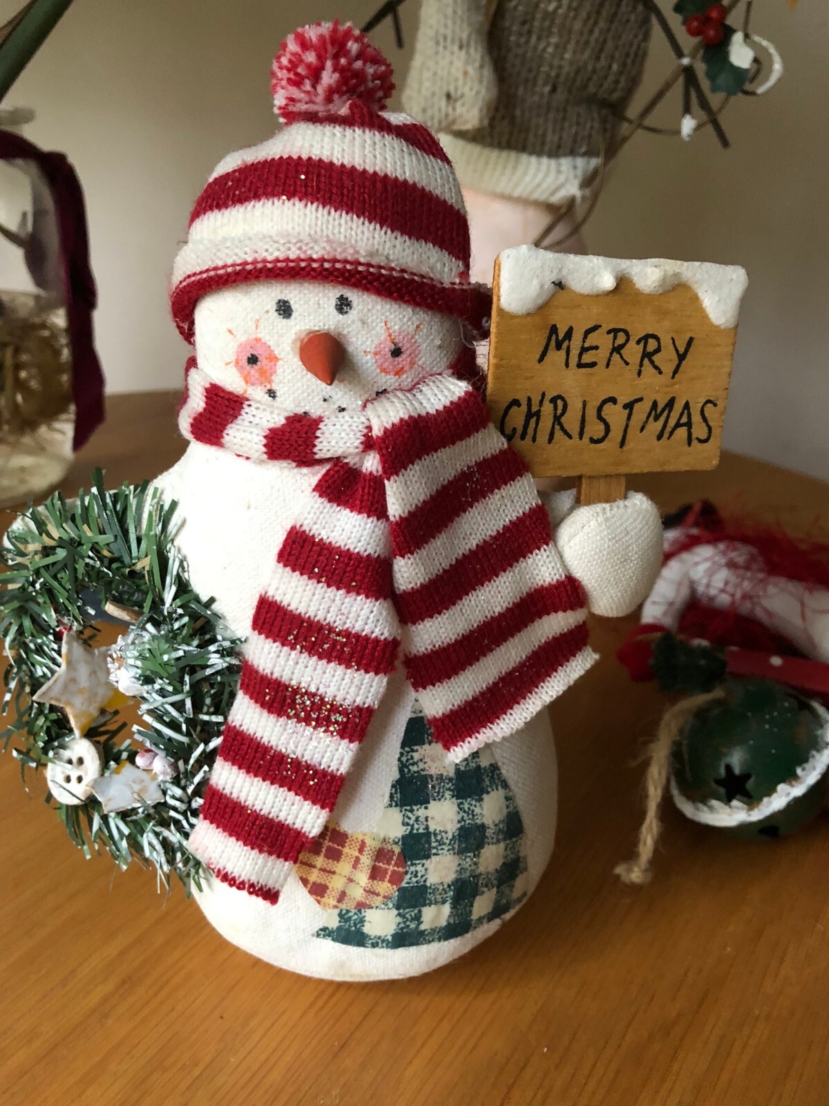 Lot of various cute snowmen Christmas decorations, bells rustic Holiday snowman