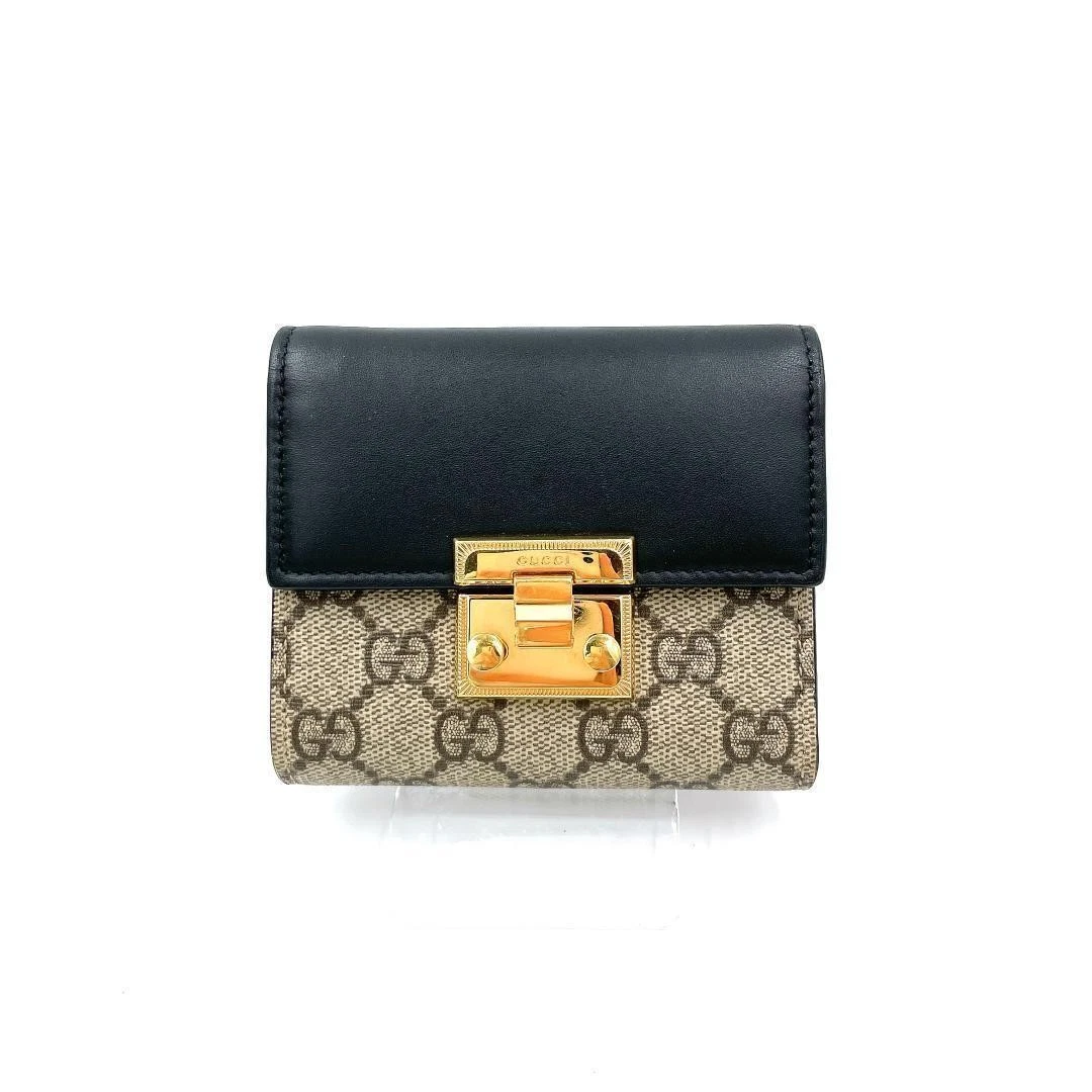 Authentique portefeuille Gucci couleur noir gris GG Supreme triple pli H10 cm L11,2 cm