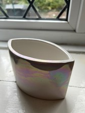 Small, unusual eliptical iridescent plant pot