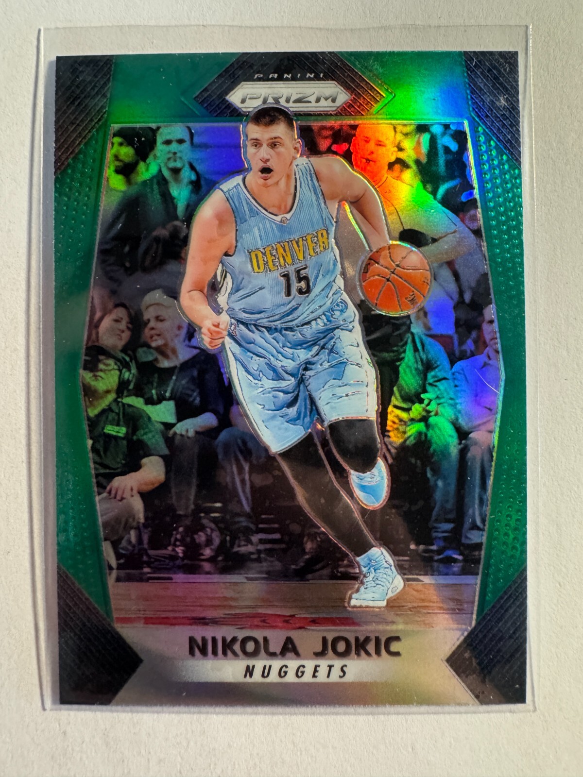 K260,638 - 2017-18 Panini Prizm Prizms Green #166 Nikola Jokic